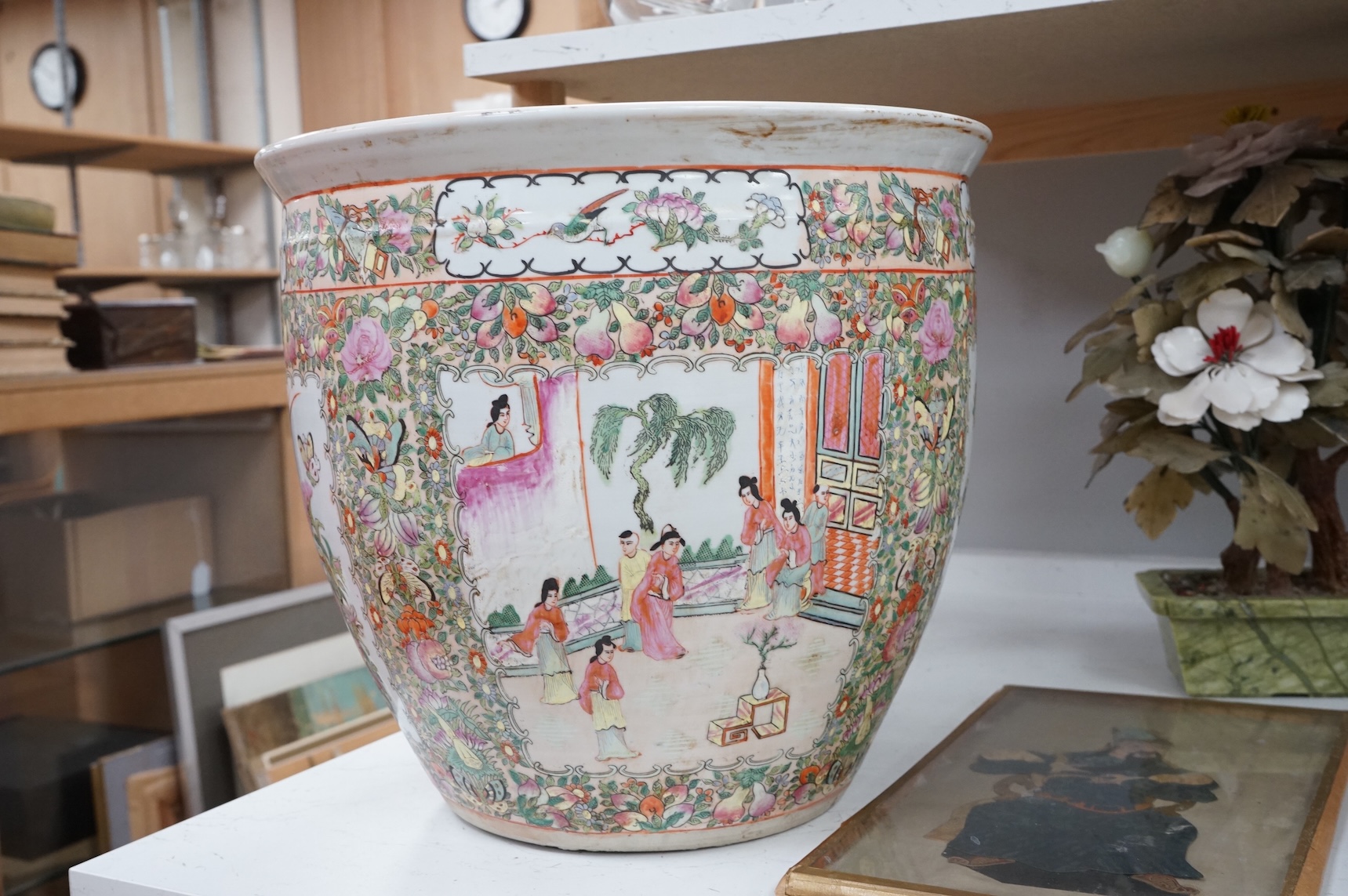 A Chinese famille Rose goldfish bowl enamelled with figures, butterflies and flowers, 41cm in diameter